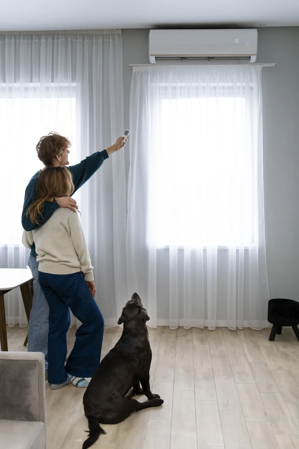 Cork homeowners enjoying a quiet Daikin wall-mounted air conditioning unit in their living room